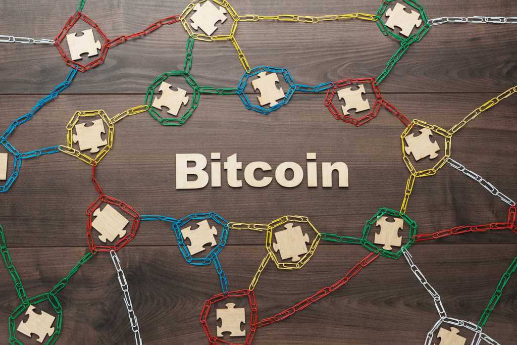 como o bitcoin funciona dentro do contexto do blockchain